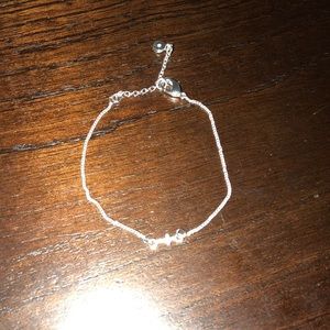 Lauren Conrad cross bracelet